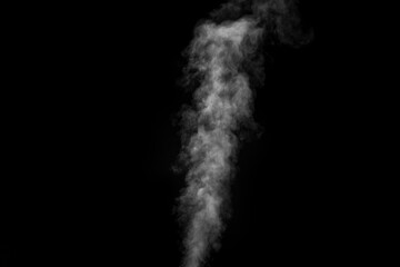 White smoke on black background. Figured smoke on a dark background. Abstract background, design element, for overlay on pictures