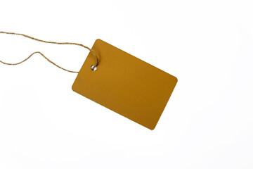 On a white isolated background a yellow label with a rope. Space for text. Tag for discount promotions