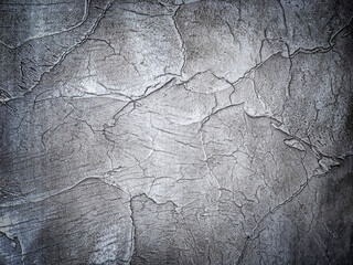 Texture of old wall with decorative plaster dark gray and silver colors.