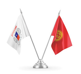 Kyrgyzstan and Mayotte table flags isolated on white 3D rendering