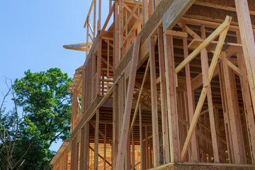 Obraz premium New home construction framing of a house under construction