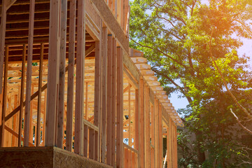 Obraz premium Wooden house in American beams the view of frame structure on a new development