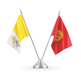 Kyrgyzstan and Vatican table flags isolated on white 3D rendering