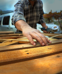 carpenter cutting wood