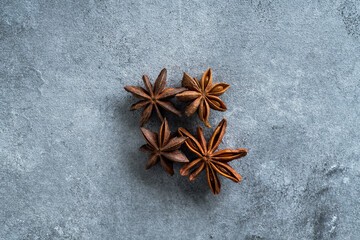 Anise stars on the rustic background. Background and textures. 