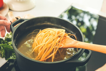 Pasta boiling in cooking pot