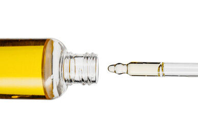 Bottle with essential oil on white background
