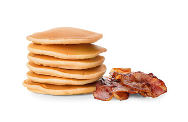 Tasty pancakes with fried bacon on white background