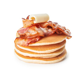 Tasty pancakes with fried bacon on white background