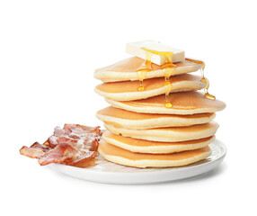 Plate of tasty pancakes with fried bacon and butter on white background