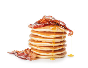 Tasty pancakes with fried bacon on white background