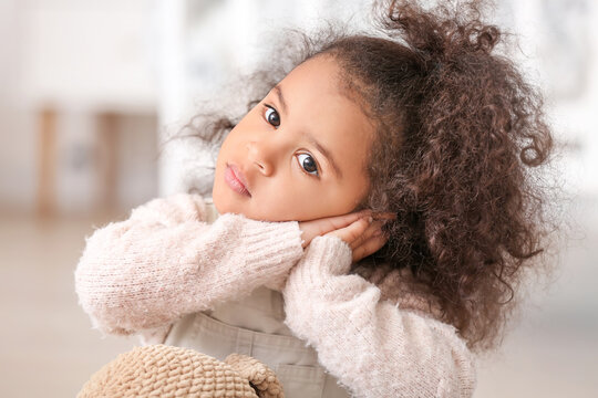 Cute African-American Baby Girl At Home