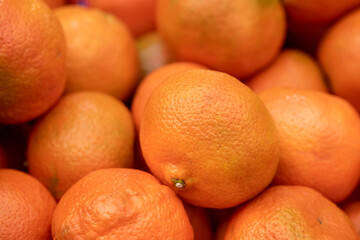 New fresh tangerines at the city market for sale