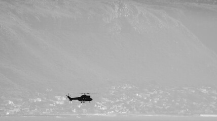 Fototapeta premium Helicopter at sea during Navy training exercises