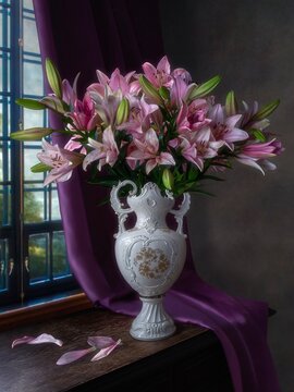 Still life with splendid bouquet of pink lily