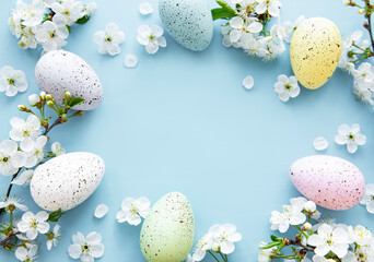 Colorful Easter eggs with spring blossom flowers