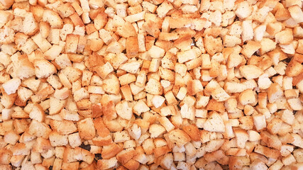 Background of a pile of golden croutons