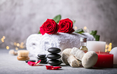 Obraz na płótnie Canvas Wellness decoration, spa massage setting, oil on stone background. Valentine's Day Zen and relax concept.