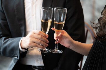 Couples toasting and drinking wine together