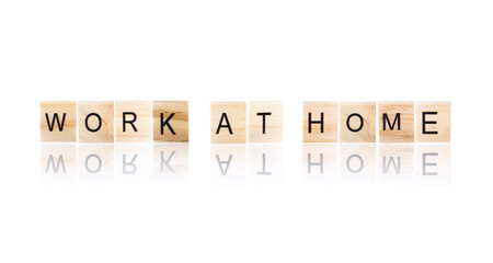 Work at home wooden word.