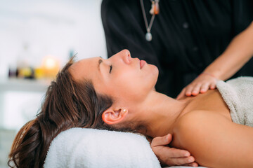 Ayurveda Massage Treatment. Massaging Shoulders with Ayurvedic Essential Oils