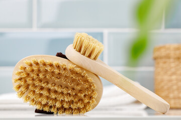 Wooden massage body brush in the bathroom