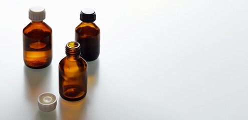 Set of small brown glass bottles