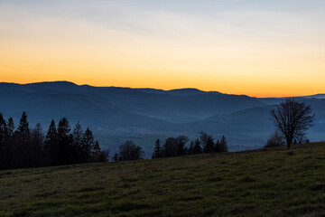 Fototapeta na wymiar Moravskoslezske Beskydy mountain rqange from Bahenec in Slezske Beskydy mountains in Czech republic after sunset