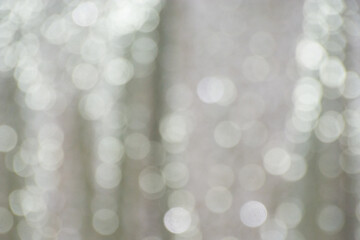 Festive New Year and Christmas bokeh. Beautiful gray lights for design