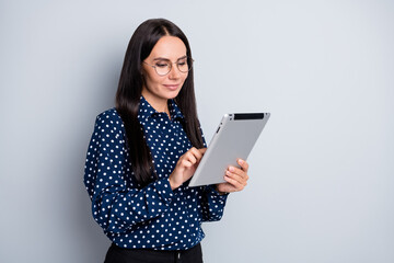 Profile side view portrait of lovely cheery businesslady using device browsing copy space research...