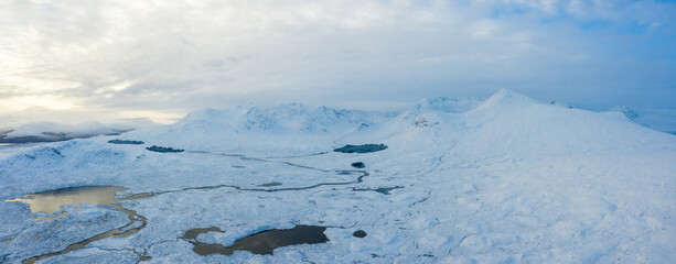 A view of Lochan na h-Achlaise on rannoch moor in the argyll region of the highlands of Scotland during a winter day near glen coe