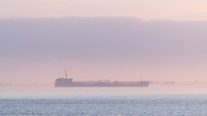 Oil tanker in foggy sea