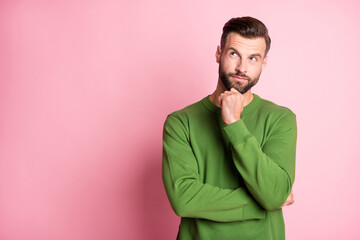 Photo portrait of curious thoughtful man looking empty space got idea isolated pastel pink color background