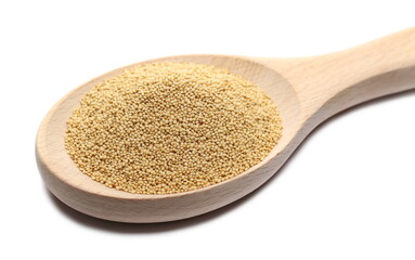 Amaranth seed pile in wooden spoon isolated on white background