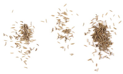 Cumin, caraway seeds pile isolated on white background, top view