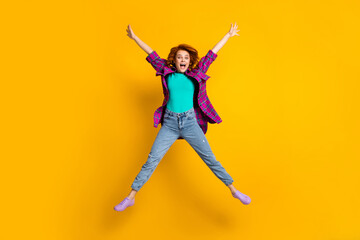 Fototapeta na wymiar Full length portrait of attractive playful lady jumping star figure wear magenta outfit isolated on yellow color background