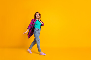 Full body portrait of curly hairstyle lady arm on cheek open mouth purple long shirt isolated on yellow color background