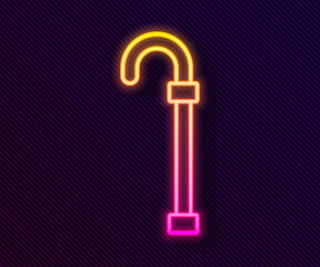 Glowing neon line Walking stick cane icon isolated on black background. Vector.