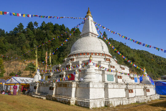 Buddhist monument Chendebji chorten near Trongsa in Central Bhutan is a stupa built in the Nepalese style decorated with prayer flags and banners during annual festival
