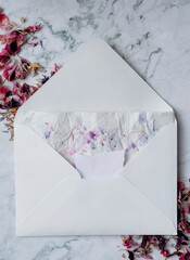 romantic card with dried flowers space to write