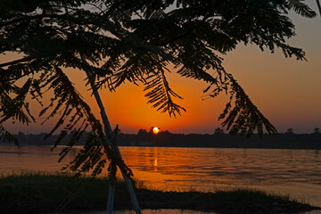 Landscape view of large river nile in Egypt at sunset