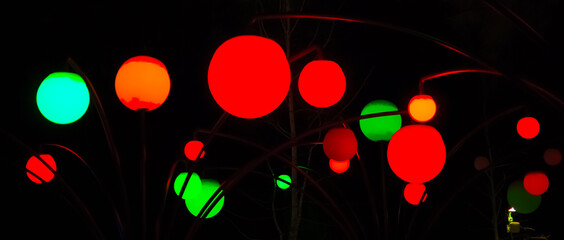 Colorful round lights on a dark background