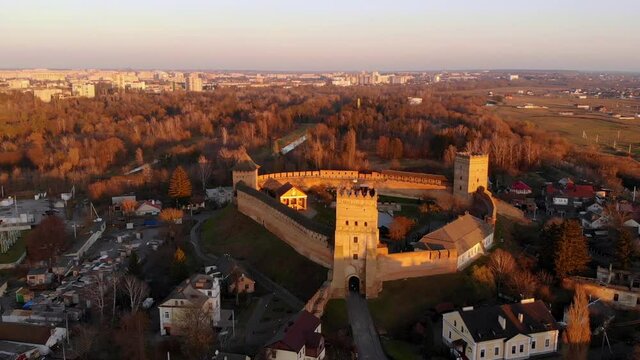 Historic castle at sunset. Ancient Cossack fortress. Shooting from a height.