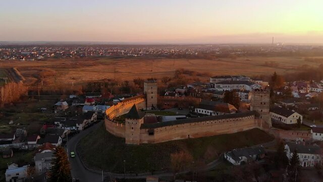 Historic castle at sunset. Ancient Cossack fortress. Shooting from a height.
