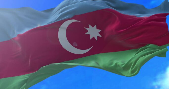 The national flag of the Republic of Azerbaijan is a horizontal tricolour featuring three equally sized fesses of bright blue, red, and green, with a white crescent and an eight-pointed star in the ce