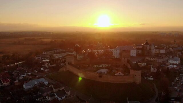 Historic castle at sunset. Ancient Cossack fortress. Shooting from a height.