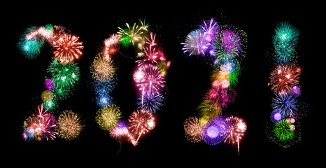 2021 New Year.  Two thousand twenty one Happy New Year. Numbers are made of holiday fireworks over...