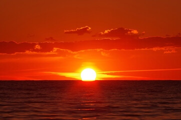 sea sunset with lighted clouds 