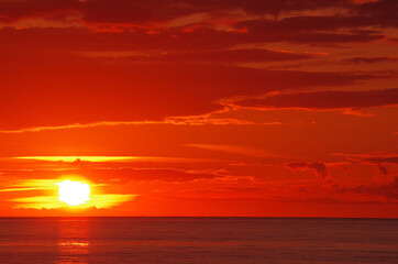 sea sunset with lighted clouds 