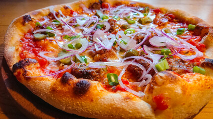 Delicious and appetizing pizza photographed a close up